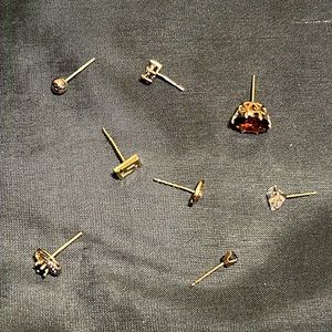 8 yellow gold mismatched post earrings 6 are 14k and 2 are 10k gold